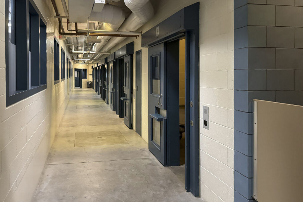 detention center hallway, illustrating the controlled access that correctional facility security needs